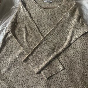 Selling a DKNY, XL women’s top, it’s tan color with goldfish accents